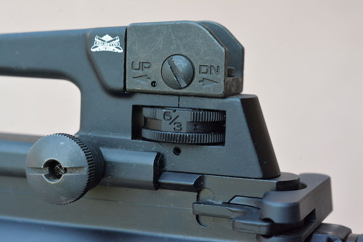 The rear sight is mil-spec adjustable.